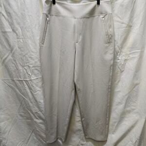 Athleta Slim Pants in khaki beige work slacks size 12 stretchy waist zip pockets